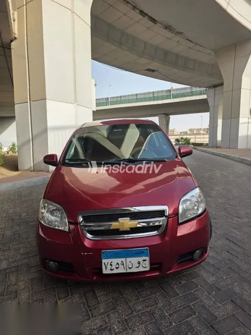 شيفروليه افيو 2012 أحمر مستعملة للبيع - 1