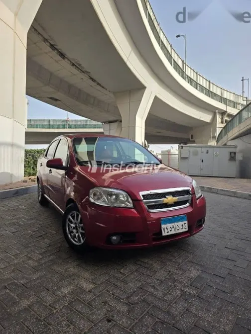 شيفروليه افيو 2012 أحمر مستعملة للبيع - 2