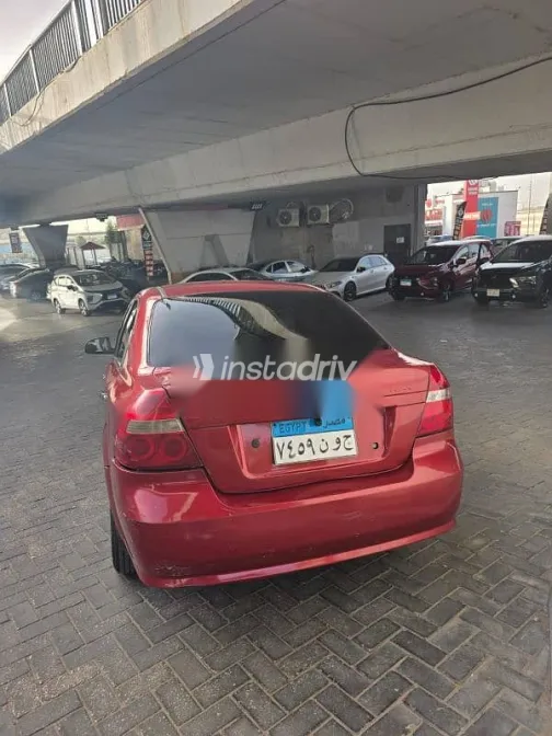 شيفروليه افيو 2012 أحمر مستعملة للبيع - 3