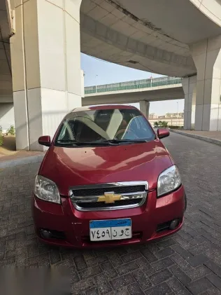 شيفروليه افيو 2012 أحمر مستعملة للبيع