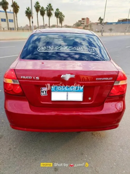 شيفروليه افيو 2014 أحمر غامق مستعملة للبيع - 2