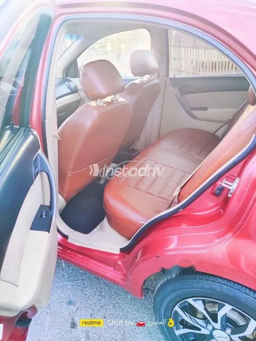 شيفروليه افيو 2014 أحمر غامق مستعملة للبيع - 5