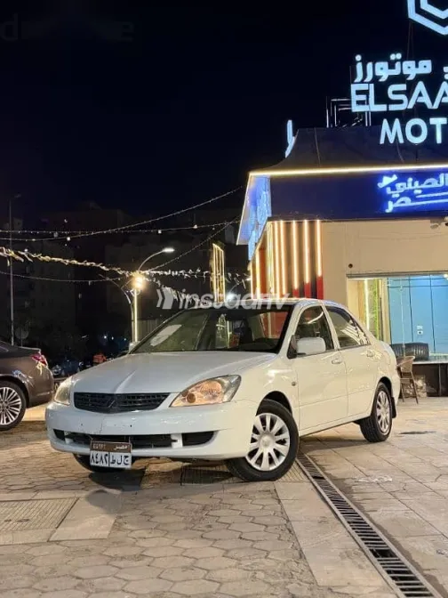 ميتسوبيشي لانسر 2013 أبيض مستعملة للبيع - 2