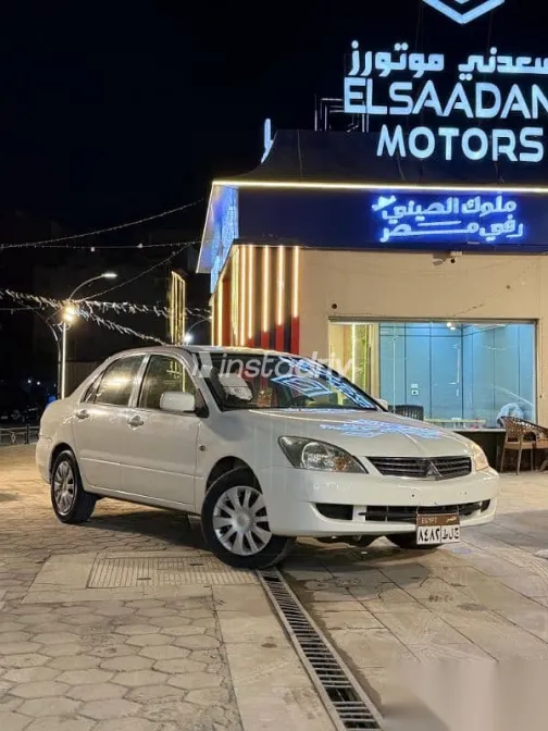 ميتسوبيشي لانسر 2013 أبيض مستعملة للبيع - 3