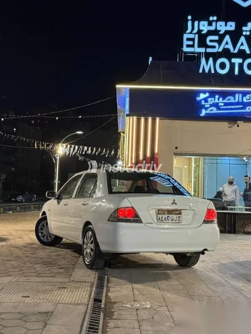 ميتسوبيشي لانسر 2013 أبيض مستعملة للبيع - 4