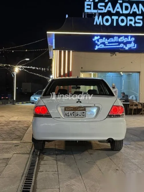 ميتسوبيشي لانسر 2013 أبيض مستعملة للبيع - 5