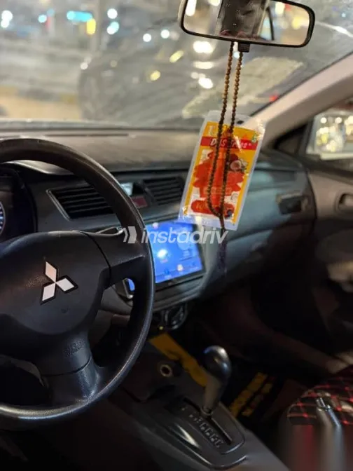 ميتسوبيشي لانسر 2013 أبيض مستعملة للبيع - 6