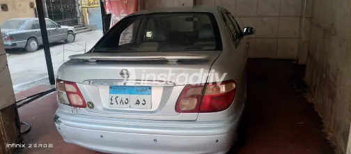 نيسان صنى 2002 أبيض مستعملة للبيع - 7