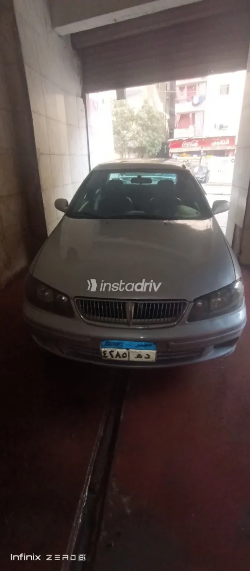 نيسان صنى 2002 أبيض مستعملة للبيع - 9