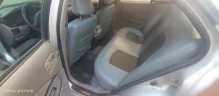 نيسان صنى 2002 أبيض مستعملة للبيع