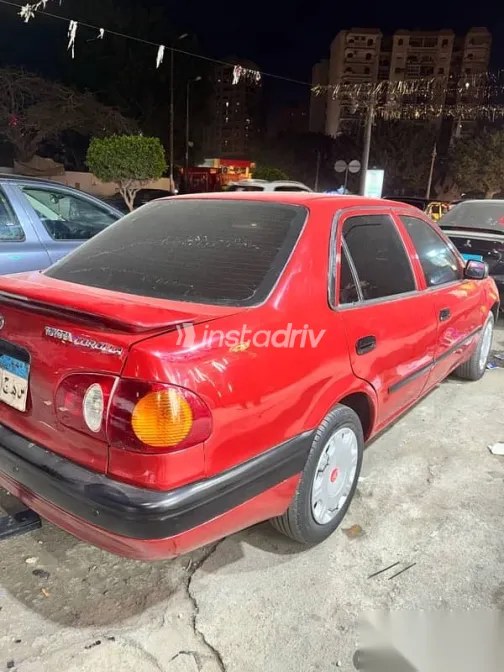 تويوتا كورولا 1999 أحمر مستعملة للبيع - 1