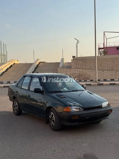 سوزوكى سويفت 1993 أخضر مستعملة للبيع - 6