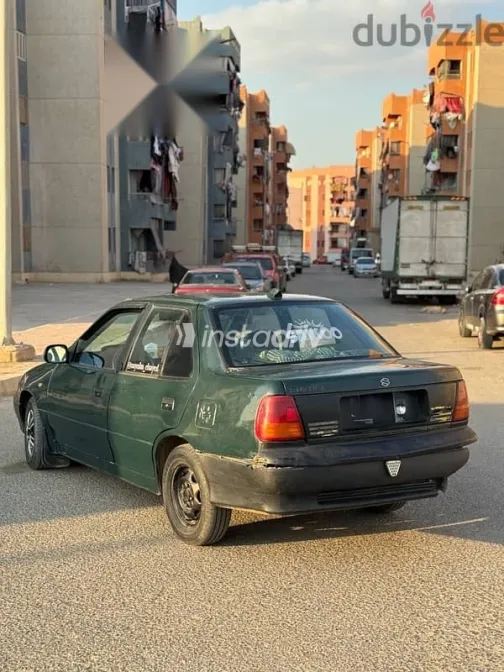 سوزوكى سويفت 1993 أخضر مستعملة للبيع - 8