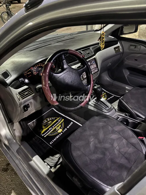 ميتسوبيشي لانسر بومة 2005 أبيض مستعملة للبيع - 3