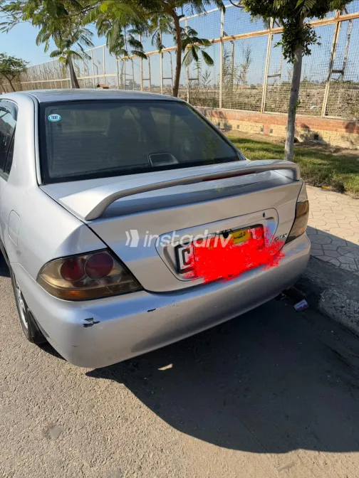 ميتسوبيشي لانسر بومة 2005 أبيض مستعملة للبيع - 7