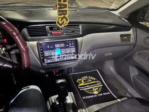 ميتسوبيشي لانسر بومة 2005 أبيض مستعملة للبيع - 10