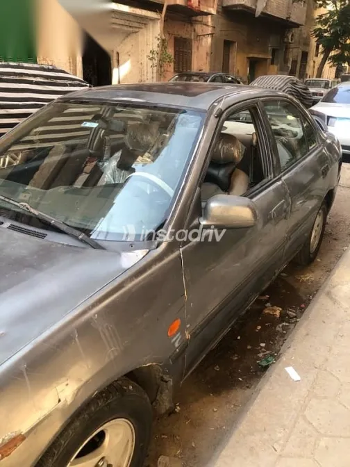 ميتسوبيشي لانسر 1999 فضي مستعملة للبيع - 3