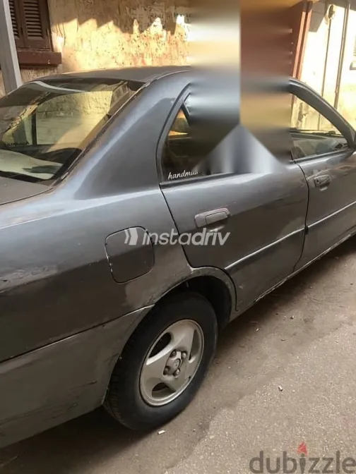 ميتسوبيشي لانسر 1999 فضي مستعملة للبيع - 4