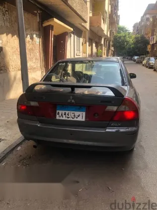 ميتسوبيشي لانسر 1999 فضي مستعملة للبيع