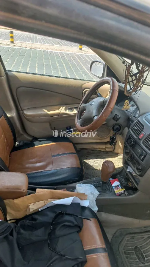 نيسان صنى 2007 أبيض مستعملة للبيع - 4