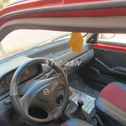 فيات اونو 2007 أحمر مستعملة للبيع - 7