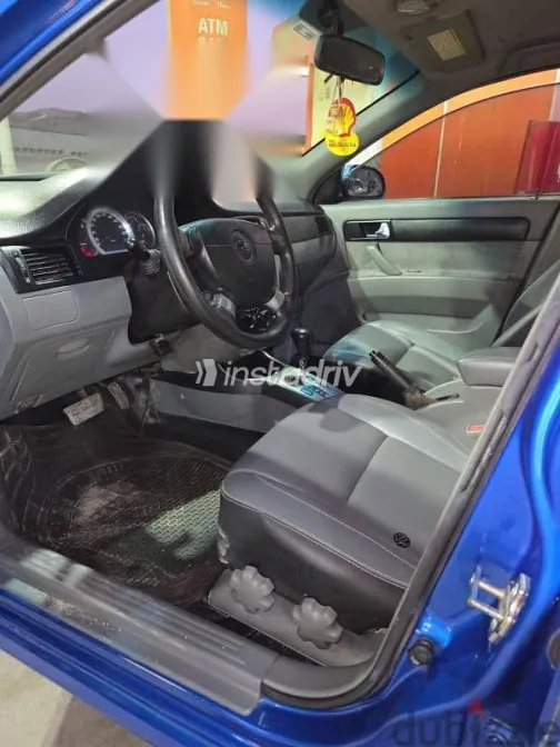 شيفروليه أوبترا 2009 أزرق غامق مستعملة للبيع - 2