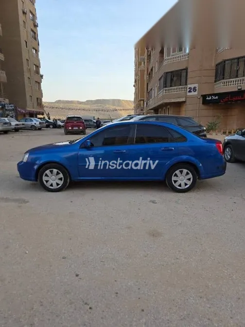 شيفروليه أوبترا 2009 أزرق غامق مستعملة للبيع - 3