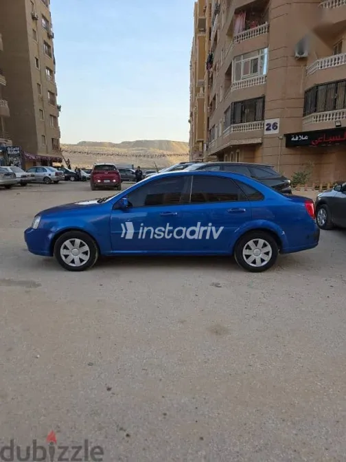 شيفروليه أوبترا 2009 أزرق غامق مستعملة للبيع - 5