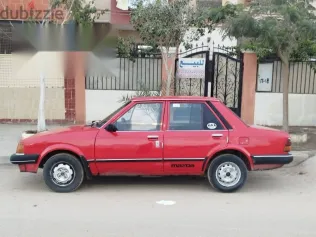 مازدا 323 1982 أحمر مستعملة للبيع