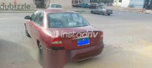 دايو نوبيرا 2001 أحمر مستعملة للبيع - 2