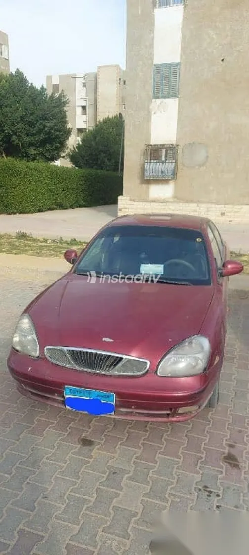 دايو نوبيرا 2001 أحمر مستعملة للبيع - 3