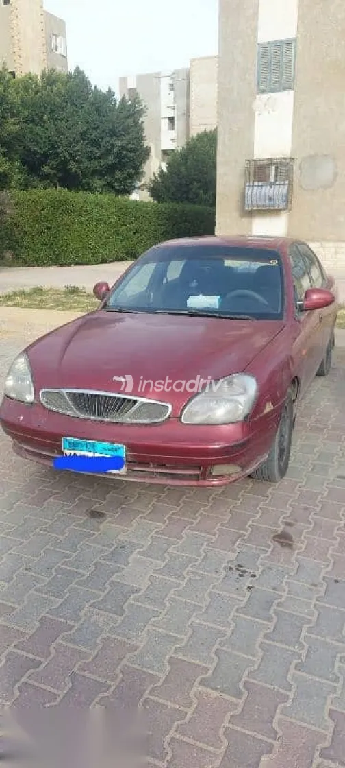 دايو نوبيرا 2001 أحمر مستعملة للبيع - 4