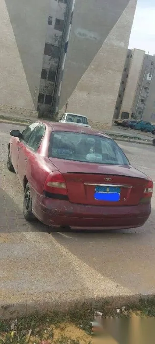 دايو نوبيرا 2001 أحمر مستعملة للبيع