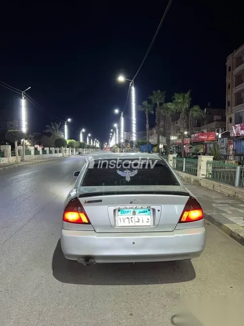 ميتسوبيشي ميراج 1999 رمادي مستعملة للبيع - 2