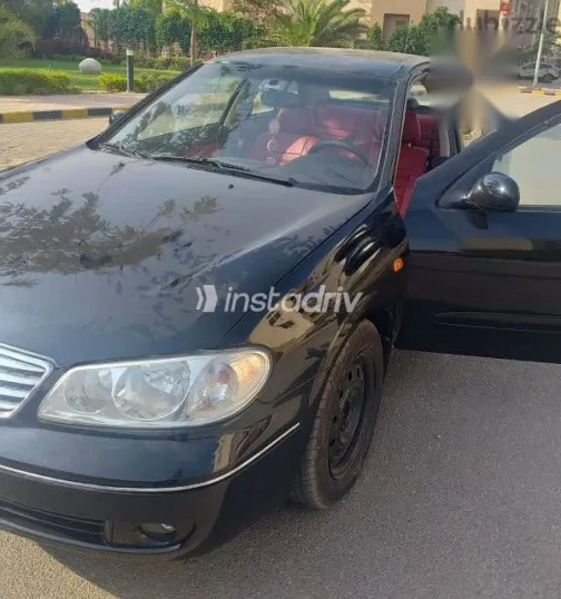 نيسان صنى 2009 أسود مستعملة للبيع - 1