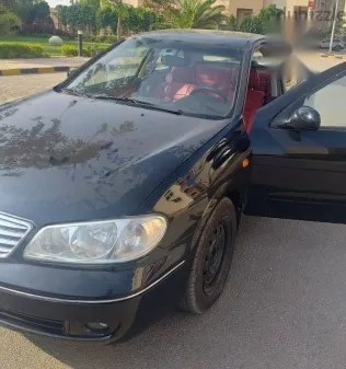 نيسان صنى 2009 أسود مستعملة للبيع