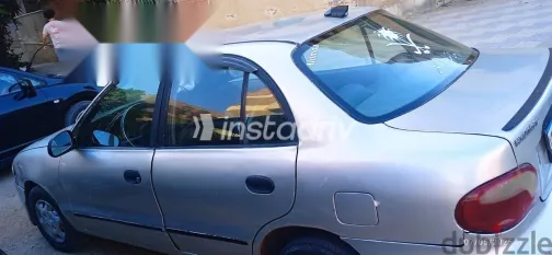 هيونداي اكسنت 2005 رمادي مستعملة للبيع - 1