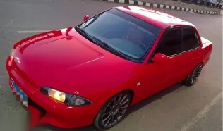 بروتون ويرا 2006 أحمر مستعملة للبيع