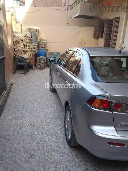 ميتسوبيشي لانسر 2017 رمادي مستعملة للبيع - 7