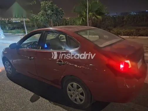 هيونداي إلنترا 2010 أحمر مستعملة للبيع - 6