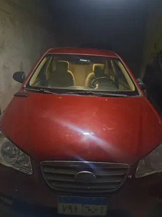 هيونداي إلنترا 2010 أحمر مستعملة للبيع