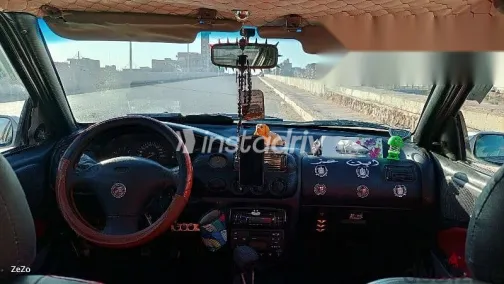 فورد اسكورت 1998 فضي مستعملة للبيع - 1