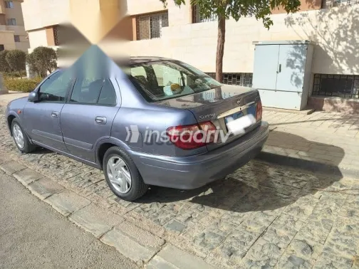 نيسان صنى 2003 أبيض مستعملة للبيع - 1