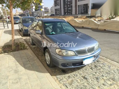 نيسان صنى 2003 أبيض مستعملة للبيع - 2