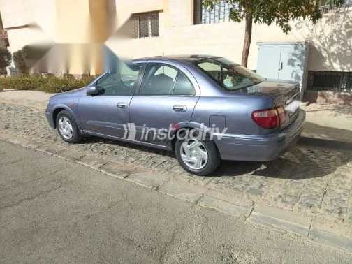 نيسان صنى 2003 أبيض مستعملة للبيع - 4