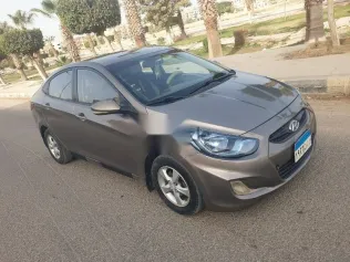 هيونداي اكسنت 2015 ذهبي مستعملة للبيع