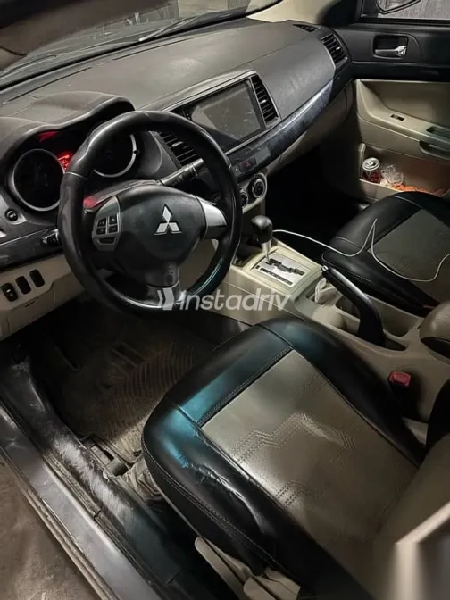 ميتسوبيشي لانسر 2015 رمادي مستعملة للبيع - 4