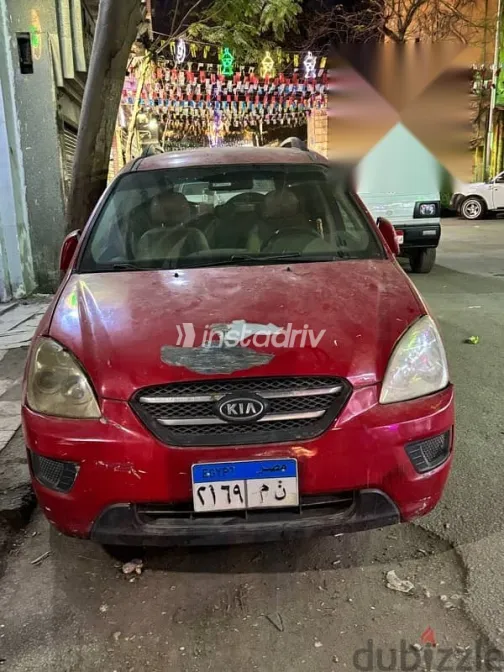 كيا كارينز 2010 أحمر مستعملة للبيع - 3