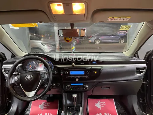 تويوتا كورولا 2015 أبيض مستعملة للبيع - 2