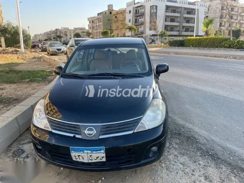 نيسان تيدا 2012 أسود مستعملة للبيع - 1